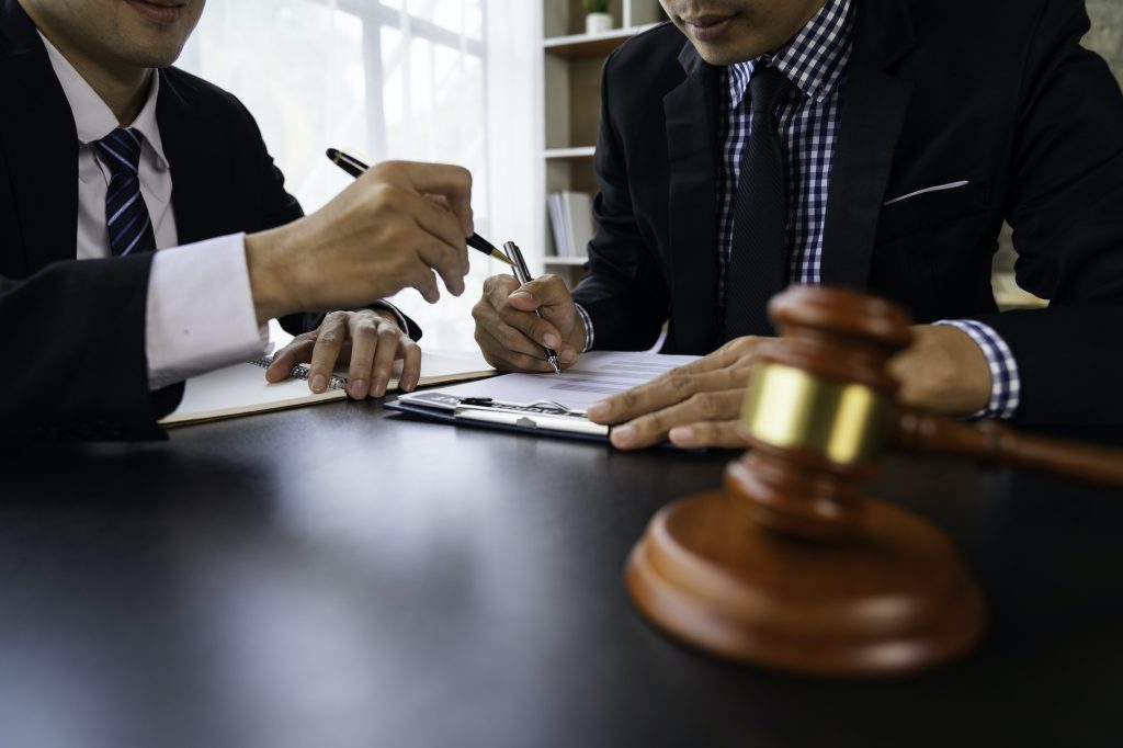 Business law concept, Lawyer business Consultation between male lawyers and business clients, tax an